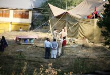 Can forensics provide answers? Inside the Tent bodies of Neelofar and Asiya being exhumed for forensic tests. Pgoto: Bilal Bahadur