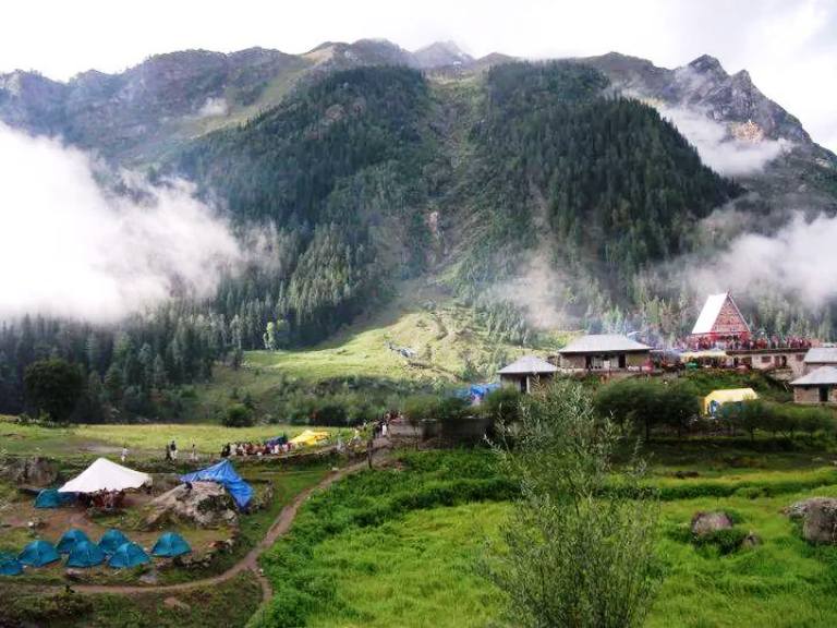 The Machail village lives in clouds virtually. At the farther end is the temple where the yatra concludes