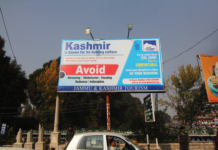 Inducing Fear A Hoarding with messages portraying Kashmiris as Cheats -- Photo:Bilal Bahadur.