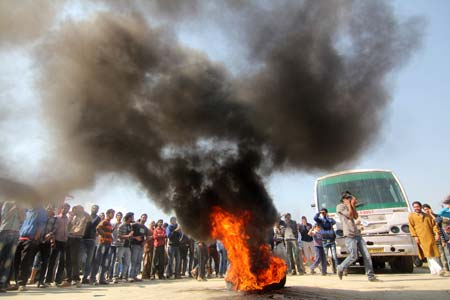 People burned tyres in protest to the LPG crisis in the valley-Photo:Bilal Bahadur