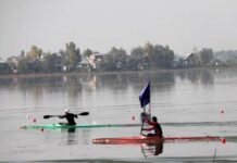 KC championship in full gear at Dal Inaugural function of Kayakeing at Dal Lake -- Photo: Bilal Bahadur.