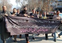 Curfew like restrictions in Srinagar Kashmiri Shiite Muslims mourners march during Muharram procession in Srinagar 25 November 2012, defying the restrictions placed by authorities to prevent religious processions. Restrictions were imposed in some parts of Srinagar