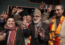 Ali Mohammad Sagar celebrating the victory of Coalition candidates. Monga and Dar are also in the picture. -- Photo: Bilal Bahadur
