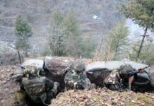 Soldiers watching their counterparts on the other side of the divide : Photo: Abid Nabi