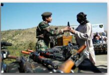 A Job For Every Surrender, Report Says A Kashmiri militant surrenders in front of a former General officer Commanding of 19 infantary Div Major Gen. Ramesh Halgali in Baramulla on 20th April 2007.