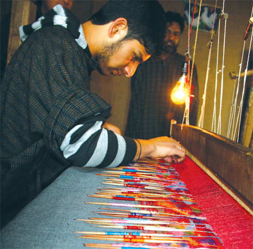 A Kani Shawl artisan at work: a Bilal Bahadur photo