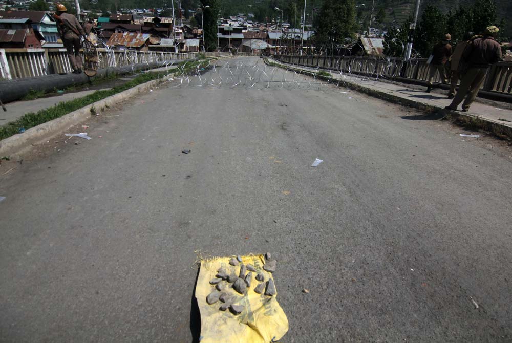 Stark Message: At the point where Old town Baramulla was wired down, these stones were seen collected beforehand by cops.