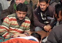 Police allegedly throws Yasin Malik on road; shutdown in Maisuma
