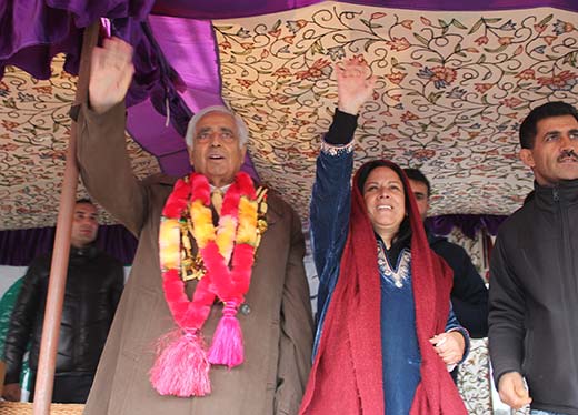 PDP patron Mufti Mohammad Sayeed alongwith Asiya Naqash during Hazratbal rally. Pic: Bilal Bahadur