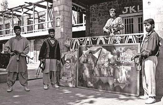 JKLF men stand alert at their Hazratbal headquarter in early 90s. Pic Courtesy: indialegalonline