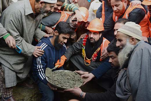 Mirwaiz stepping into the shoes of construction worker.