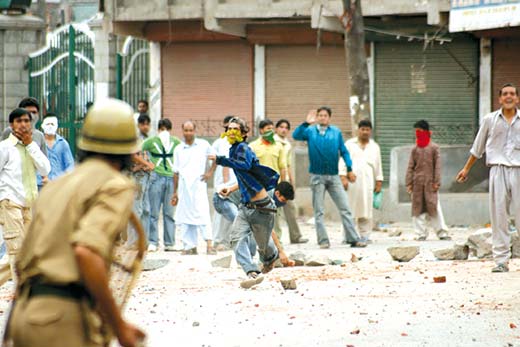 Youth engaging cops in ding dong battle during protests in Srinagar in this file photo.