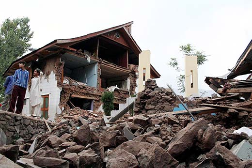 A collapsed house in 2005 earthquake in Uri. File Pic