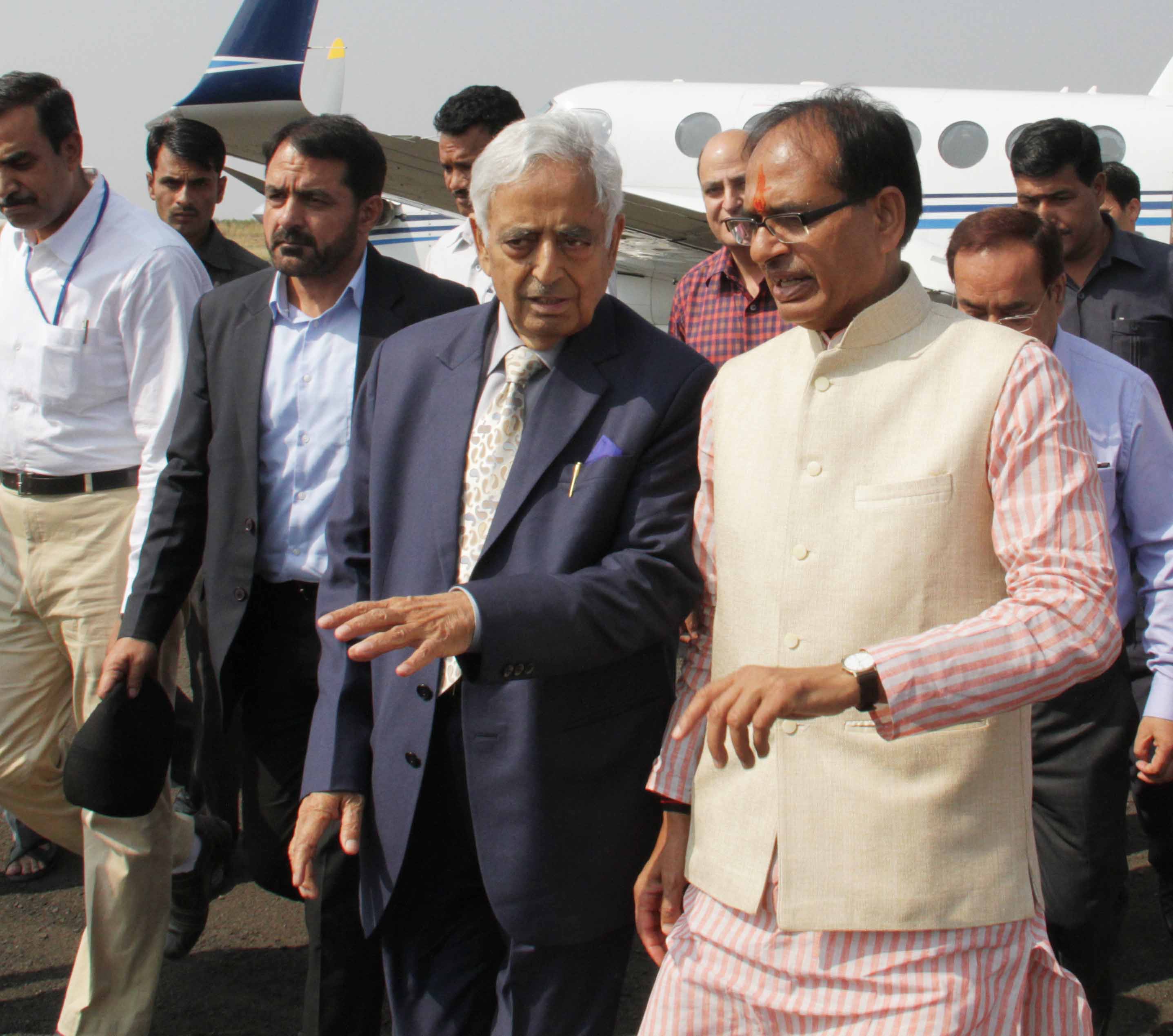 CM Mufti with his Madhya Pradesh counter part, Shivraj Singh Chouhan at Chennai airport.