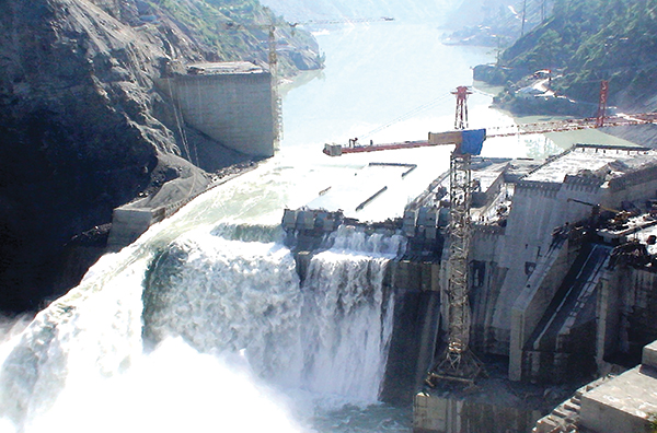 Decimated: In August 2005, the once-in-1000-year flood in Chenab overtopped the dam, creating a situation that it led to massive cost and time over-runs.