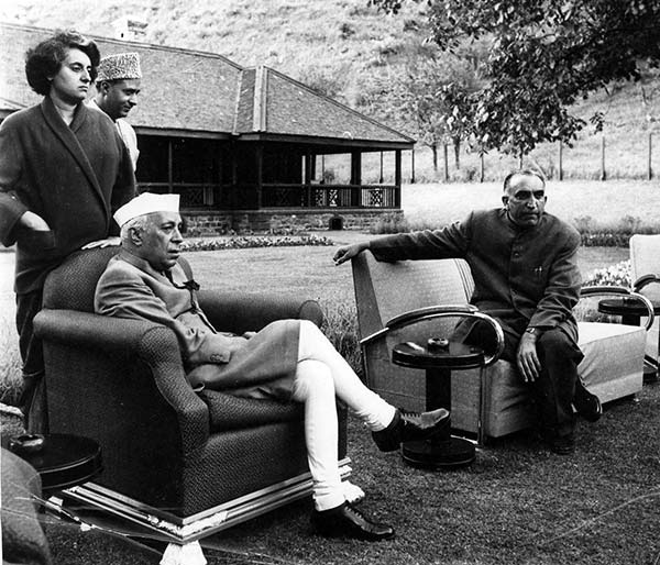 Prime Ministers Nehru and Bakhshi while Indira Gandhi is standing besides her father.