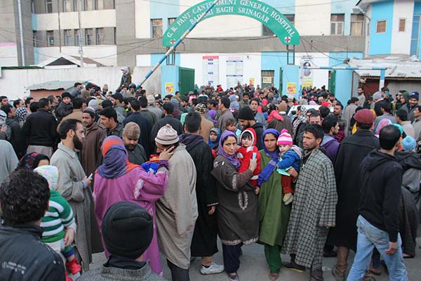 Anguished parents with their children outside GB Pant hospital on 17 January.