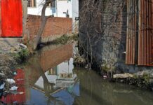 Nonstop Encroachment in Twin Srinagar Water bodies Caught SMC Napping