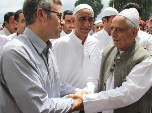 Mufti Sayeed greeting Omar Abdullah on 2015 Eid-ul-Fitr at Dargah, Hazratbal.