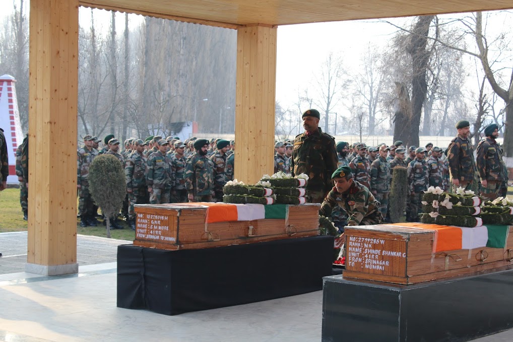Lt Gen Satish Dua, GOC of Srinagar-based 15 Corps, laying floral wreath on one of the two slian army personnel on Sunday in Badamibagh cantonment in Srinagar. (KL Image by Srinagar based spokesperson.)