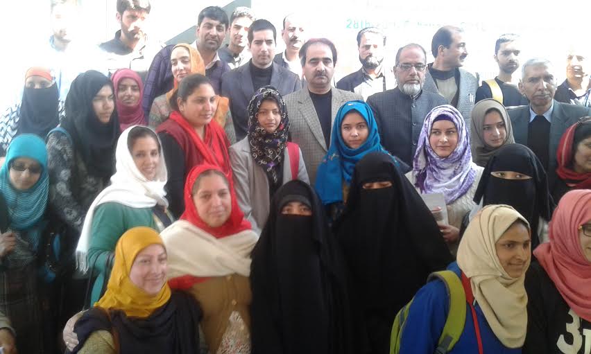 Some of the toppers posing for pictures with Dr Shah Faesal and others.