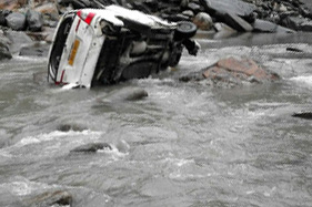 The vehicle after falling in Bishalri Nallah