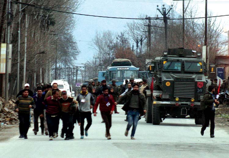 Fleeing for life: Civilian on run as militants rushed inside EDI building after they attacked CRPF convey. 