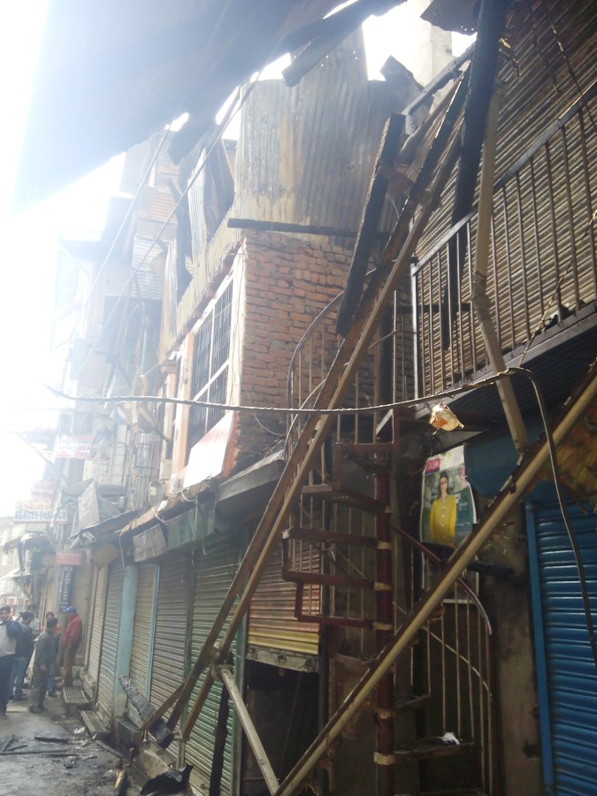Gutted shopping complex .