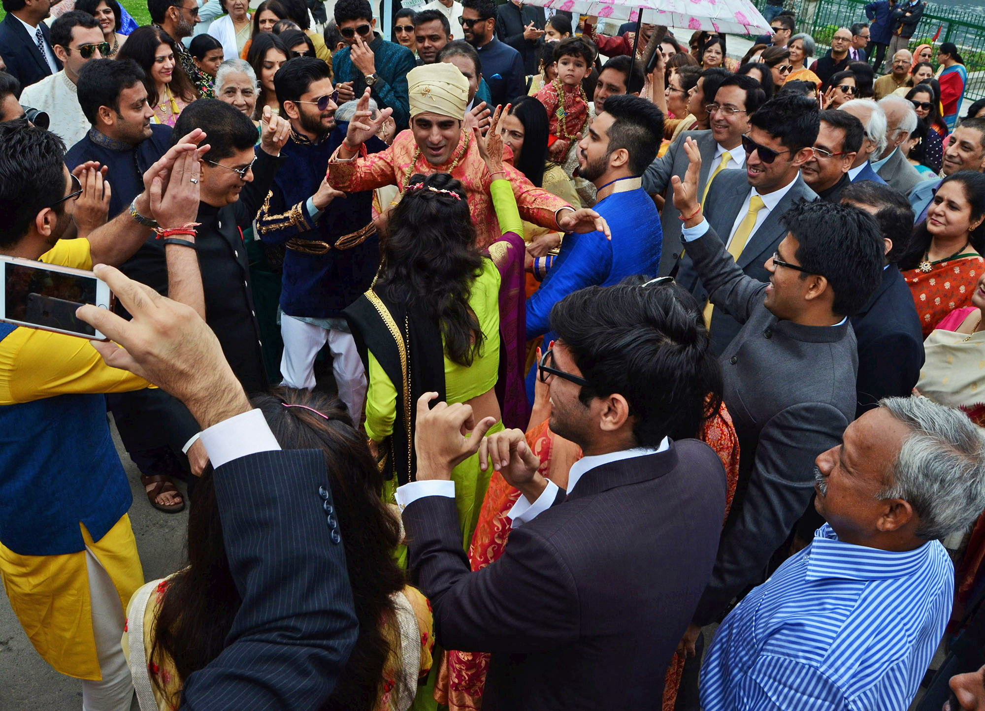 Unique scenes unfolded at the banks of world famous Dal Lake in Srinagar on Wednesday when Kashmiri Pandit families living outside performed marriage of their wards here amid much fanfare. PHOTO BY BILAL BAHADUR