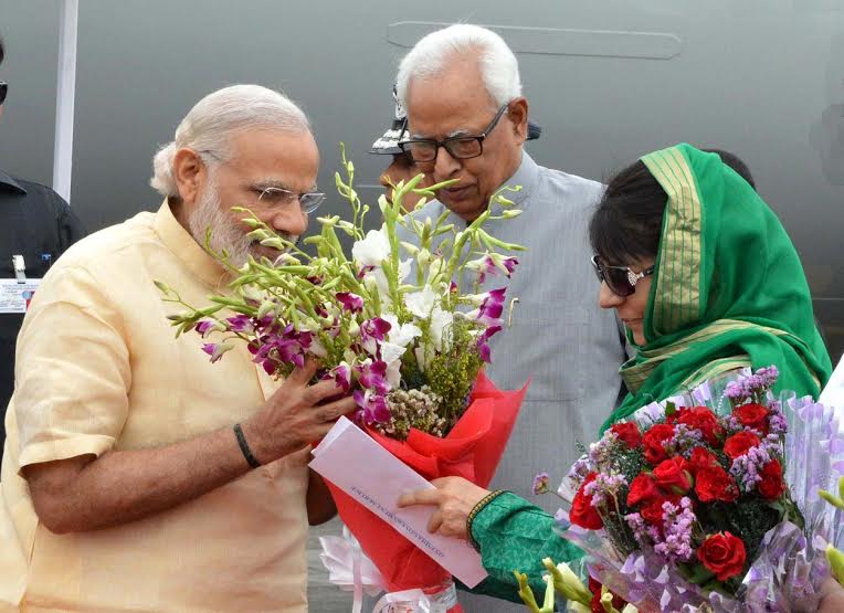 CM Mehbooba received PM Modi in Jammu early Tuesday on April 19, 2016.