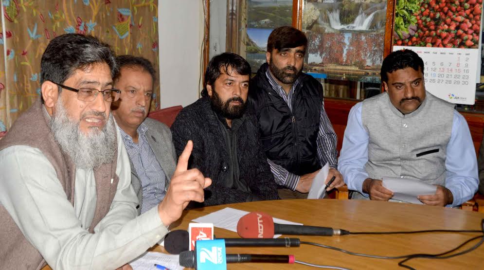 Mohammad Yasin Khan, Mushtaq Ahmad Wani and Aijaz Ahmad Sofi addressing press in Srinagar on April 17, 2016. (KL Image courtesy: Mehraj Bhat)