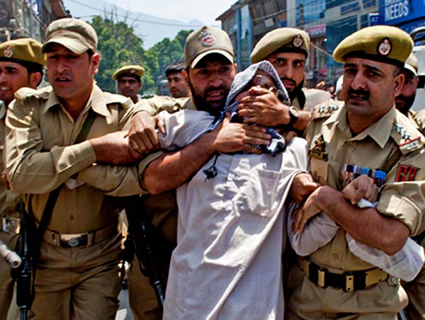 Mushtaq-ul-islam-being-detained-by-J&K-Police