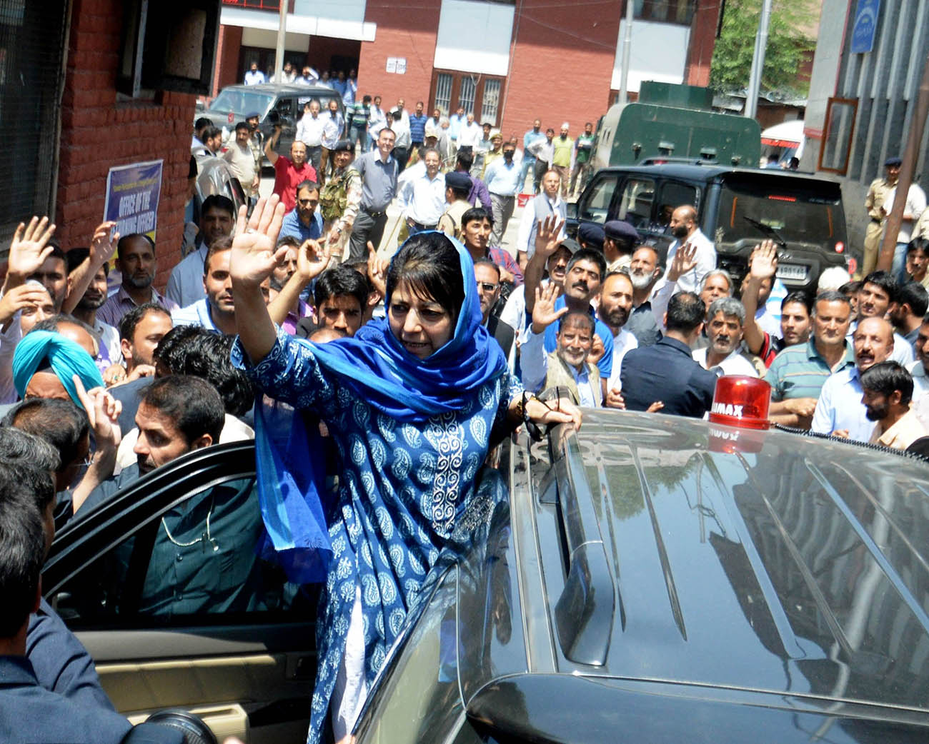 Jammu and Kashmir Chief Minister Mehbooba Mufti wave after filed her nominations for the Anantnag assembly segment bypoll on Wednesday PHOTO BY BILAL BAHADUR