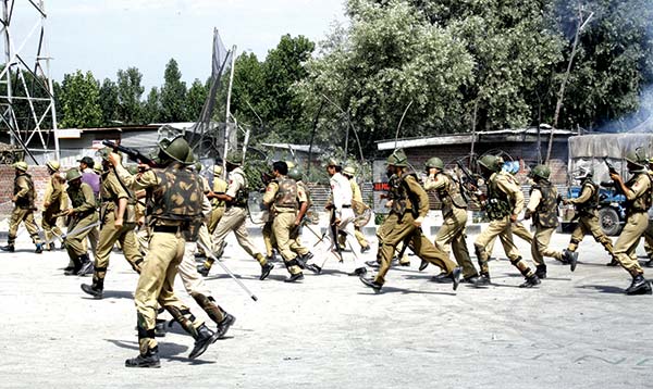 2010-Police-using-force-on-unarmed-protesters