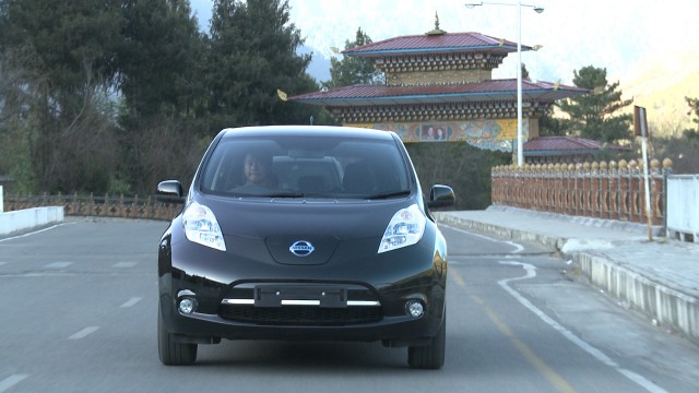 An electric Car plying on a Bhutan road.
