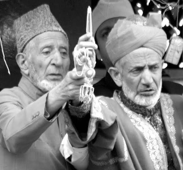 Peerzada Ghulam Jeelani (Left)