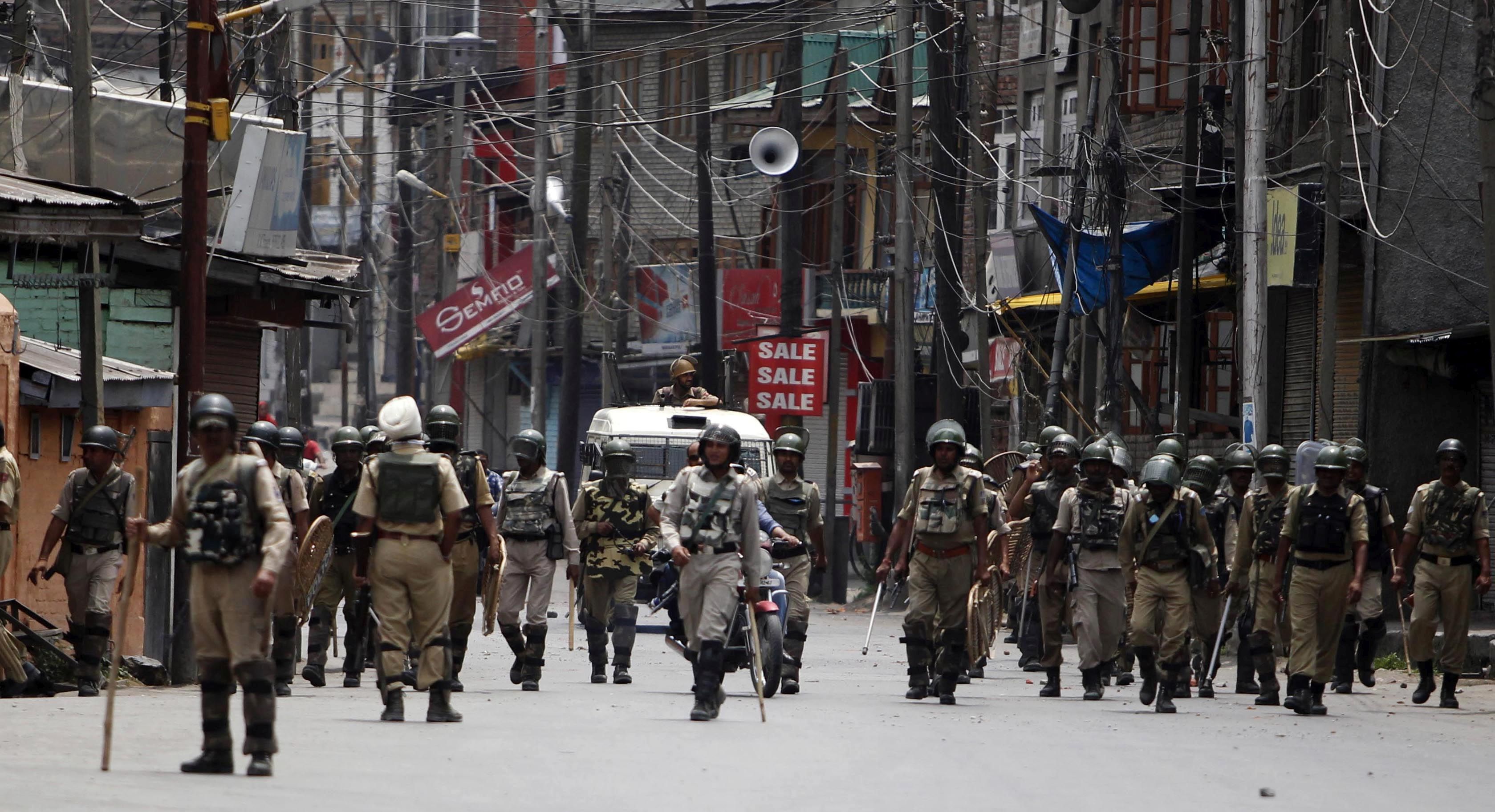 heavy deployment Paramilitary Soldiers  and police in full riot gear have been deployed  in old city  (Downtown) of Srinagar   on Tuesday after  police heavy tear gas shelling  on contain protesters  following the killing of top militant commander Burhan Muzaffar Wani. The death toll reached 48 including three militants’ 44 civilians and one policeman and over 3500 persons were injured during clashes and put separatist leaders under house arrest. PHOTO BY BILAL BAHADUR