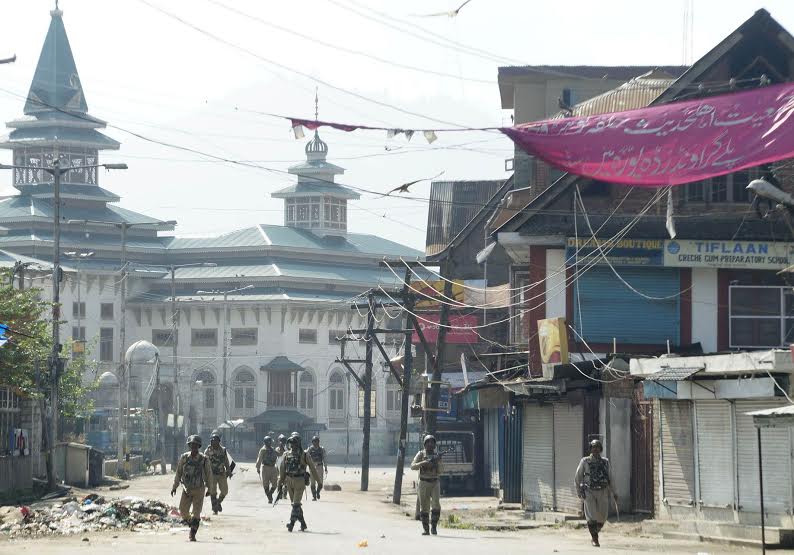 A heavy posse of CRPF personnel enforcing curfew around Dastgeer Sahib shrine near Jamia Masjid in Old Srinagar on Friday. (Bilal Bahadur)