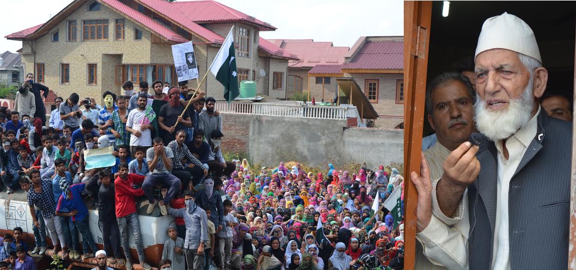 Syed Ali Geelani addressed people near his residence. geelani is banned from walking out of his home, so he opened a window of his office and addressed people who were sitting in another compartment separated from Geelani's office by a concrete wall and a lane.