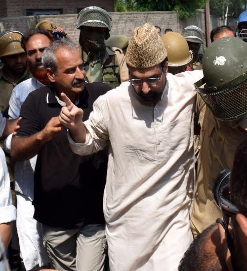 Mirwaiz caged 3