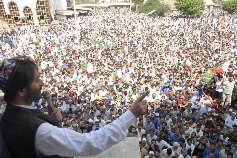 Mohammad Yasin Malik addressing faithful at Charar-i-Sharief on Friday.