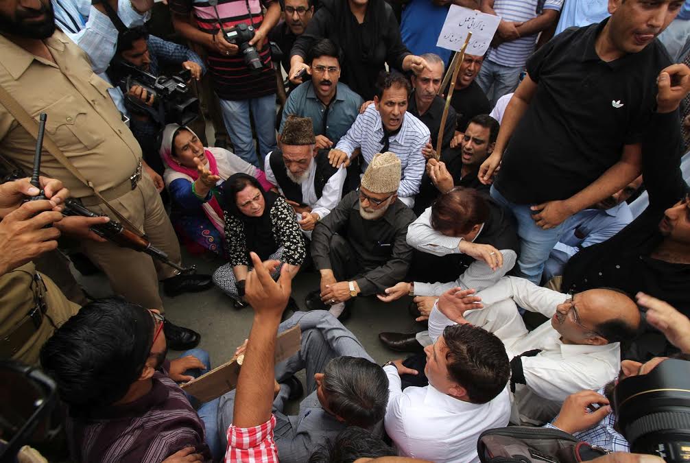 After being banned from moving out of TRC Chowk near Radio Kashmir, NC members held a sit-in protest demanding justice to slain Kashmiris during the current uprising.
