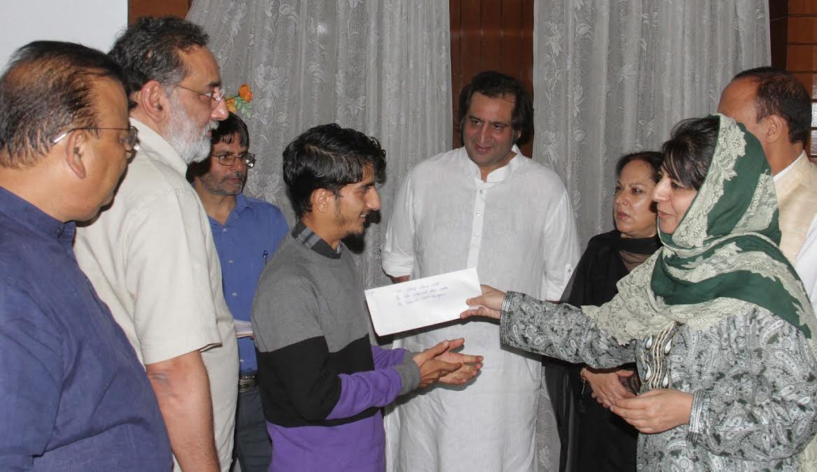 CM Ms Mehbooba Mufti giving away cheques in Sgr