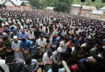 To accommodate thousands, multiple funerals held for slain Aqib in Tral People offer funeral prayers to the slain persons Aaripanthan area in central Kashmir's Budgam district on Tuesday, August 16, 2016PHOTO BY BILAL BAHADUR