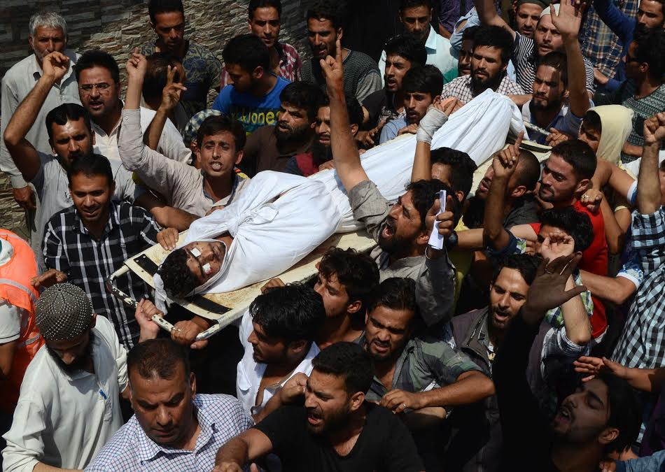 Slain Mohammad Amir Mir being taken for funeral prayers in the premises of SMHS Hospital Srinagar. (KL Image: Bilal Bahadur)