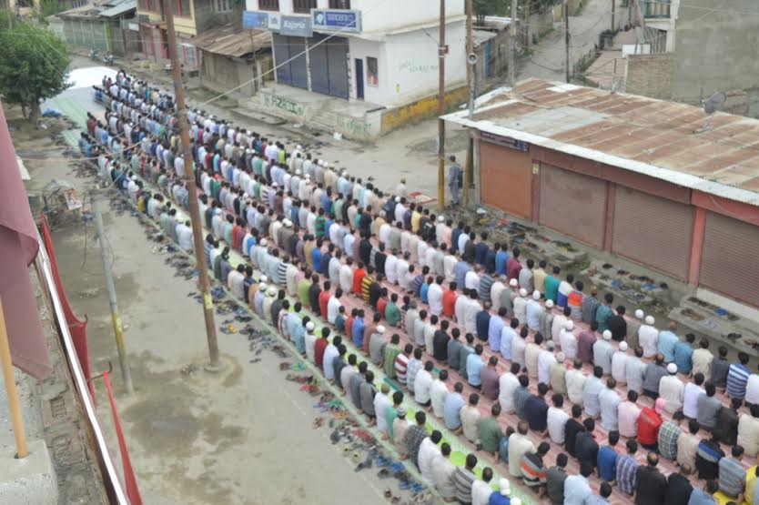 People offered 'Asr' prayers-in-open in Nowgam as a mark of protest against civilian killings in Kashmir.