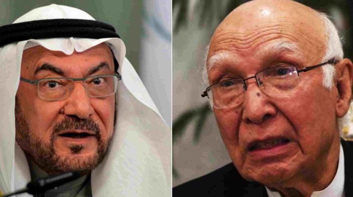 OIC Sec Gen Iyad Ameen Madani and Sartaj Aziz