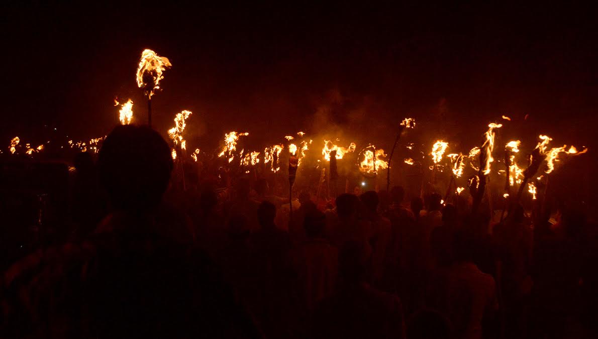 Responding to the call of united resistance leadership, people in outskirts of Srinagar late Wednesday evening took out a protest Mashaal procession. (KL Image: Mehraj Bhat)