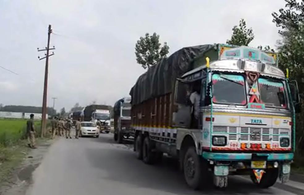 Trucks carrying fruits and other material moved out of Kashmir on Monday.