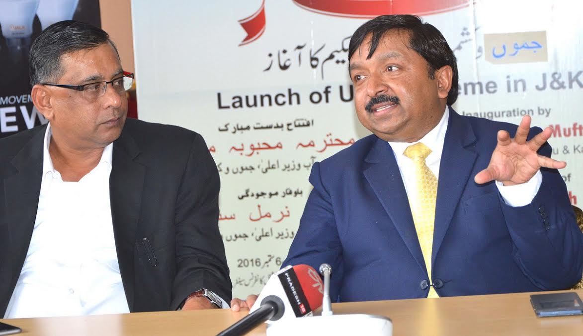 Commissioner Secretary, J&K Power Development Department, Dheeraj Gupta, flanked by Managing Director, Energy Efficiency Services Limited (EESL) Saurabh Kumar, addressing media at the launching ceremony of UJALA at SKICC on Sep 06, 2016.